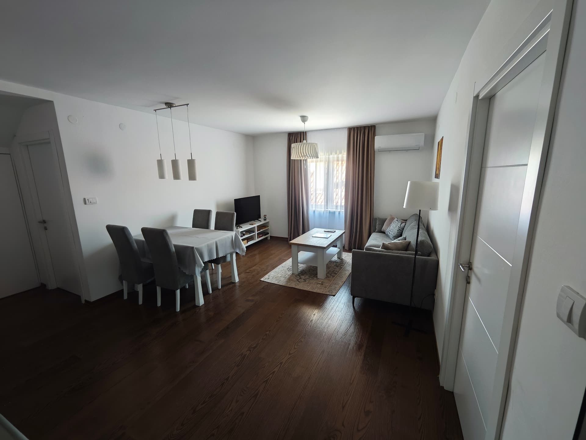 Living room with dining area – Abies Apartment
