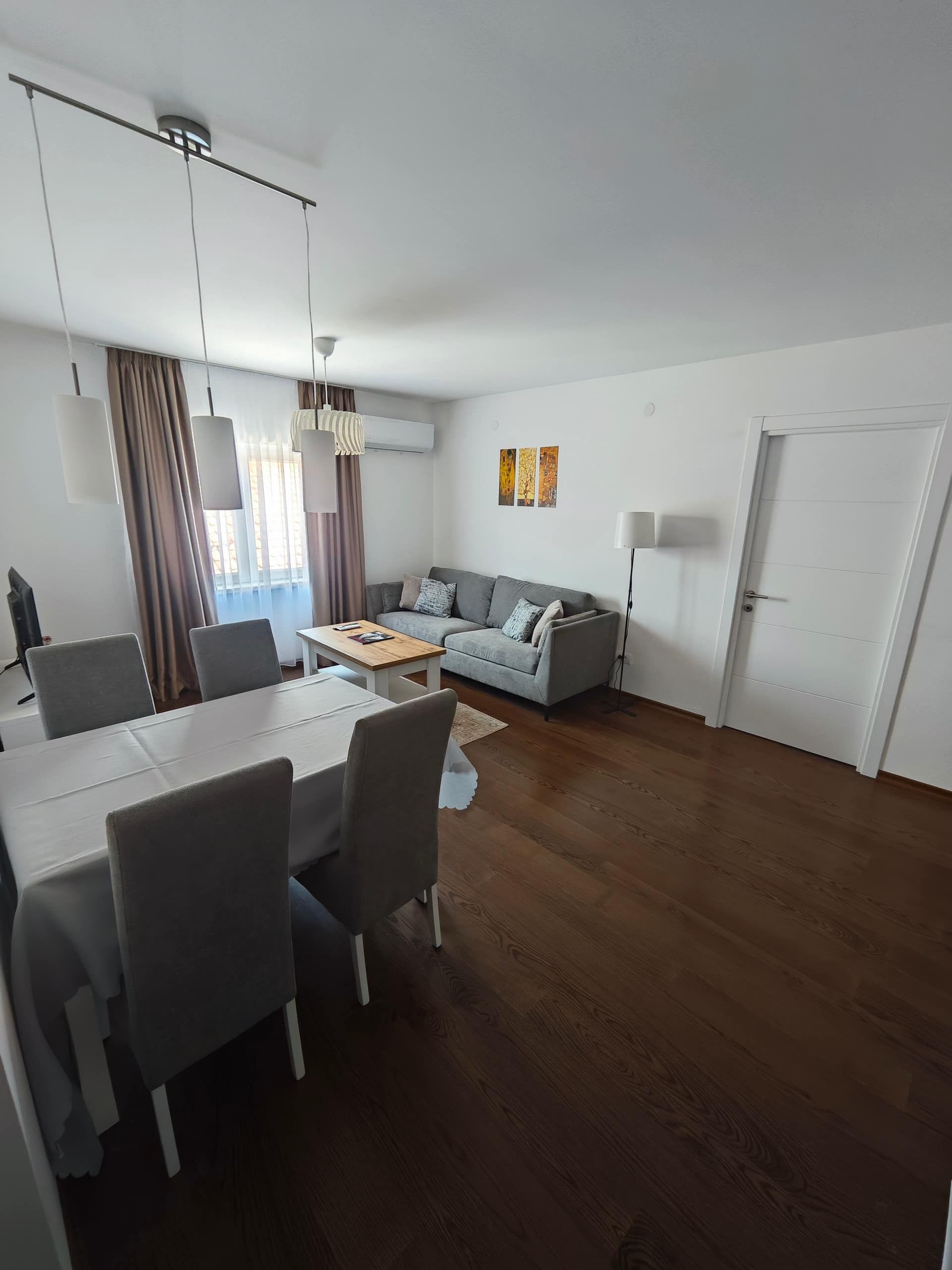 Living room with dining area – Abies Apartment